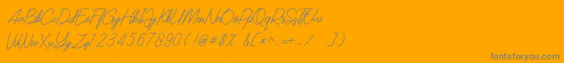 SOUTHERN JAVANICA FREE-Schriftart – Graue Schriften auf orangefarbenem Hintergrund