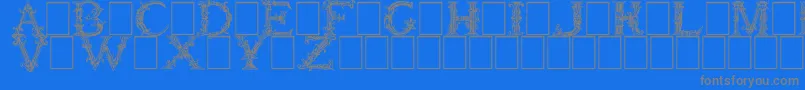 Czcionka BurgoyneInitials – szare czcionki na niebieskim tle