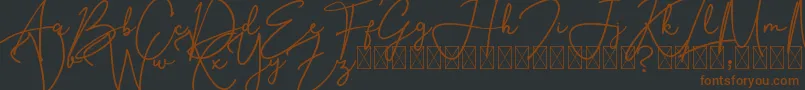 Шрифт SouthernJannie – коричневые шрифты на чёрном фоне