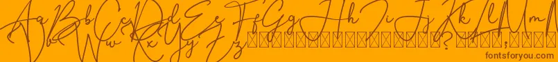 SouthernJannie-Schriftart – Braune Schriften auf orangefarbenem Hintergrund