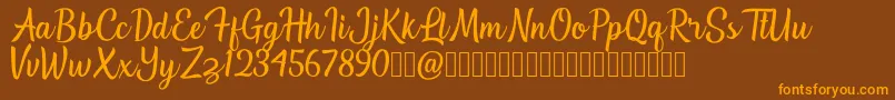 Więcej informacji o czcionce Southville Demo Czcionka Southville Demo – pomarańczowe czcionki na brązowym tle