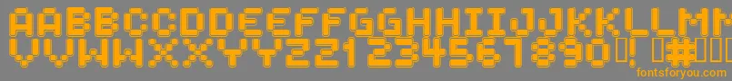 フォントSPACEBOY – オレンジの文字は灰色の背景にあります。