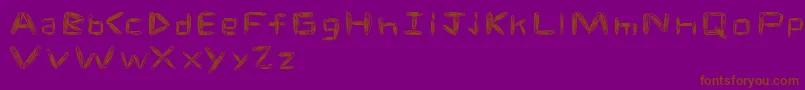 spacetime-fontti – ruskeat fontit violetilla taustalla