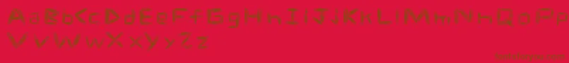 spacetime-fontti – ruskeat fontit punaisella taustalla
