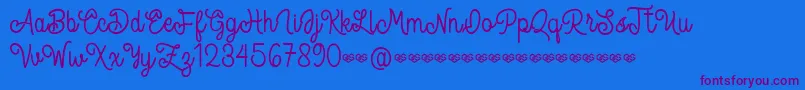Spandam Font – Purple Fonts on Blue Background