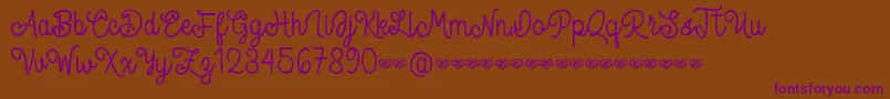 Spandam Font – Purple Fonts on Brown Background