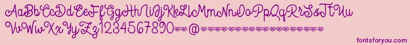 Spandam Font – Purple Fonts on Pink Background