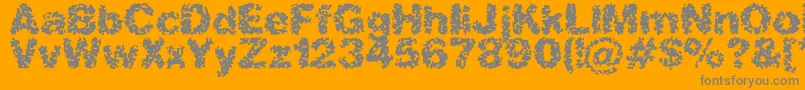 spastic2-Schriftart – Graue Schriften auf orangefarbenem Hintergrund