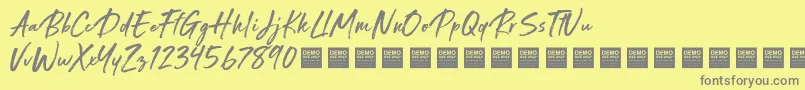 Special Request   Demo-Schriftart – Graue Schriften auf gelbem Hintergrund
