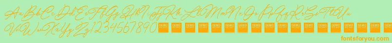 Special Touch   Demo-Schriftart – Orangefarbene Schriften auf grünem Hintergrund