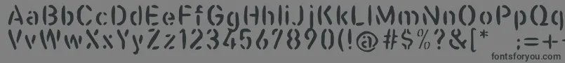 フォントCasualstencil – 黒い文字の灰色の背景