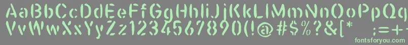 Casualstencil Font – Green Fonts on Gray Background