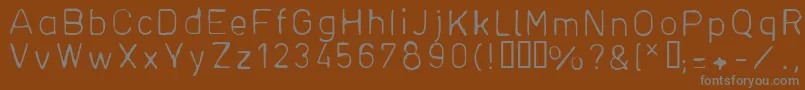 DfhDin1-Schriftart – Graue Schriften auf braunem Hintergrund