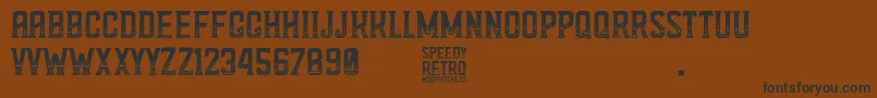 Speedy Retro-Schriftart – Schwarze Schriften auf braunem Hintergrund