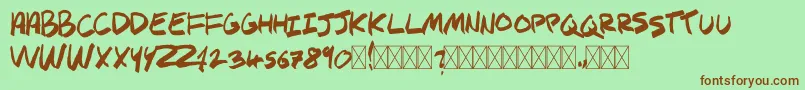 SPHYNX Font – Brown Fonts on Green Background