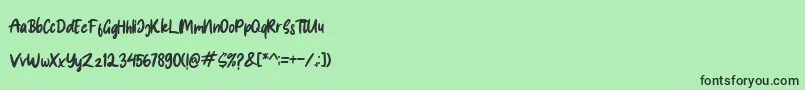 フォントSpice Girl – 緑の背景に黒い文字