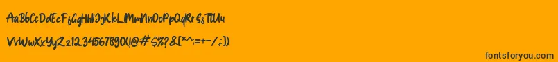 Spice Girl-fontti – mustat fontit oranssilla taustalla