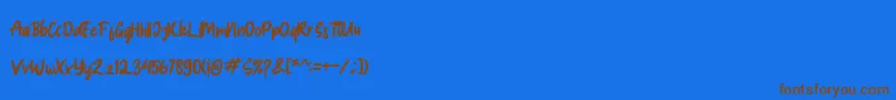 Spice Girl Font – Brown Fonts on Blue Background