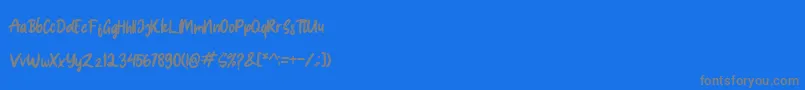 フォントSpice Girl – 青い背景に灰色の文字