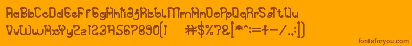 Czcionka Spicy Paprika – brązowe czcionki na pomarańczowym tle