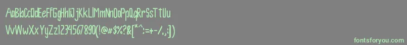 More about Spidole Font Spidole Font – Green Fonts on Gray Background