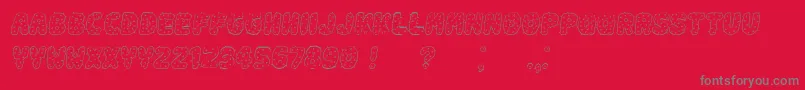Spiky Italic Font – Gray Fonts on Red Background