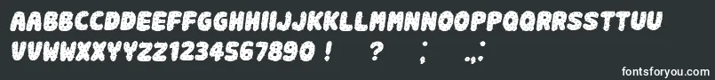 Fonte SpikyBook Italic – fontes brancas em um fundo preto