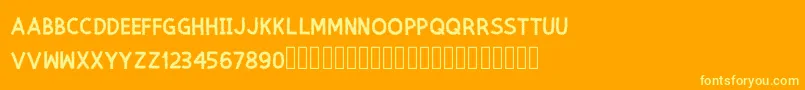 Czcionka Spine – żółte czcionki na pomarańczowym tle