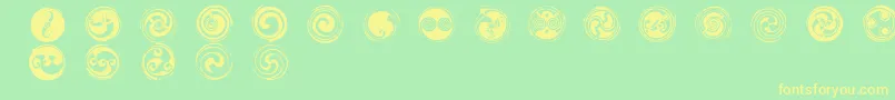 spirals  Font – Yellow Fonts on Green Background