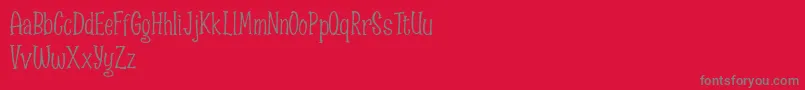 Spizzella Free font-fontti – harmaat kirjasimet punaisella taustalla