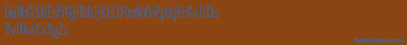 Spizzella Free font Font – Blue Fonts on Brown Background