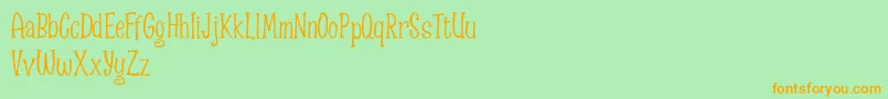 Czcionka Spizzella Free font – pomarańczowe czcionki na zielonym tle
