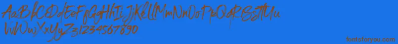 Spoiled-Schriftart – Braune Schriften auf blauem Hintergrund