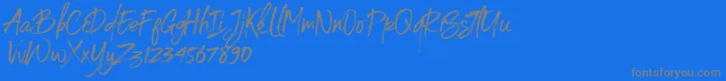 Spoiled-Schriftart – Graue Schriften auf blauem Hintergrund