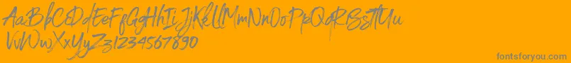 Spoiled-Schriftart – Graue Schriften auf orangefarbenem Hintergrund