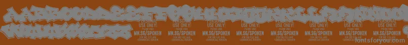 フォントSpoken PERSONAL – 茶色の背景に灰色の文字