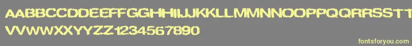 spookies Font – Yellow Fonts on Gray Background