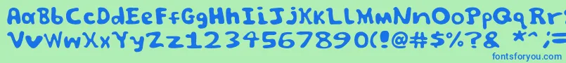 Spooky font by Jammycreamer com-fontti – siniset fontit vihreällä taustalla