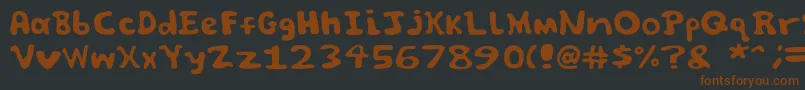 Czcionka Spooky font by Jammycreamer com – brązowe czcionki na czarnym tle