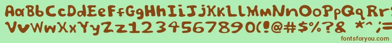 Spooky font by Jammycreamer com Font – Brown Fonts on Green Background
