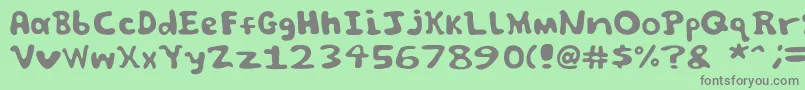 フォントSpooky font by Jammycreamer com – 緑の背景に灰色の文字