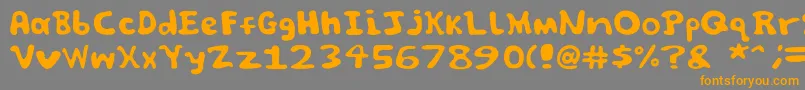 Spooky font by Jammycreamer com Font – Orange Fonts on Gray Background