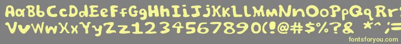 フォントSpooky font by Jammycreamer com – 黄色のフォント、灰色の背景