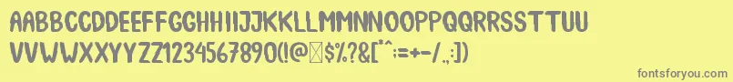 SpookyBooah Font – Gray Fonts on Yellow Background