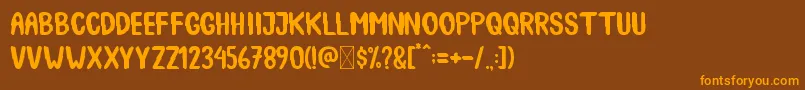 SpookyBooah Font – Orange Fonts on Brown Background