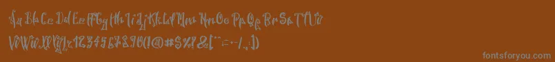 SpookyWookyRegular Font – Gray Fonts on Brown Background