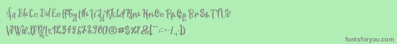 SpookyWookyRegular Font – Gray Fonts on Green Background