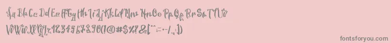 SpookyWookyRegular-Schriftart – Graue Schriften auf rosa Hintergrund