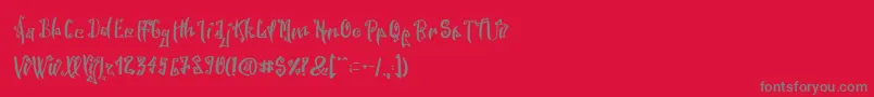 SpookyWookyRegular-Schriftart – Graue Schriften auf rotem Hintergrund