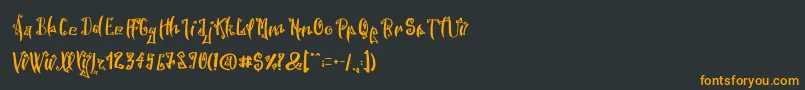 SpookyWookyRegular Font – Orange Fonts on Black Background